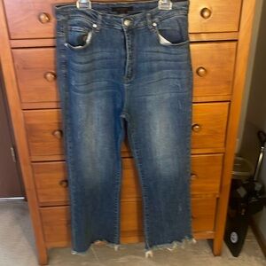 Size 1xl Risen stretch flare jeans with fringe bottom.